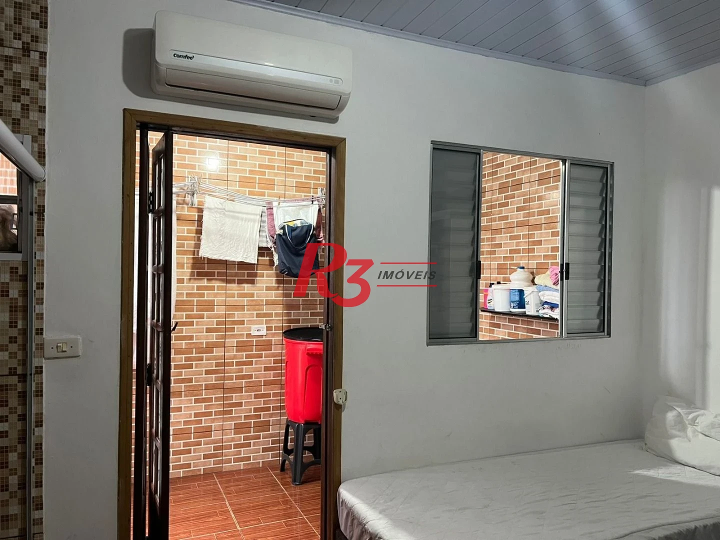 Casa à venda, 100 m² por R$ 320.000,00 - Vila Mateo Bei - São Vicente/SP