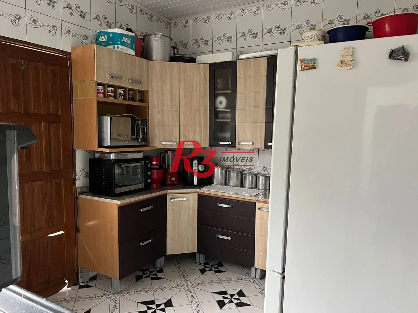 Casa à venda, 100 m² por R$ 320.000,00 - Vila Mateo Bei - São Vicente/SP