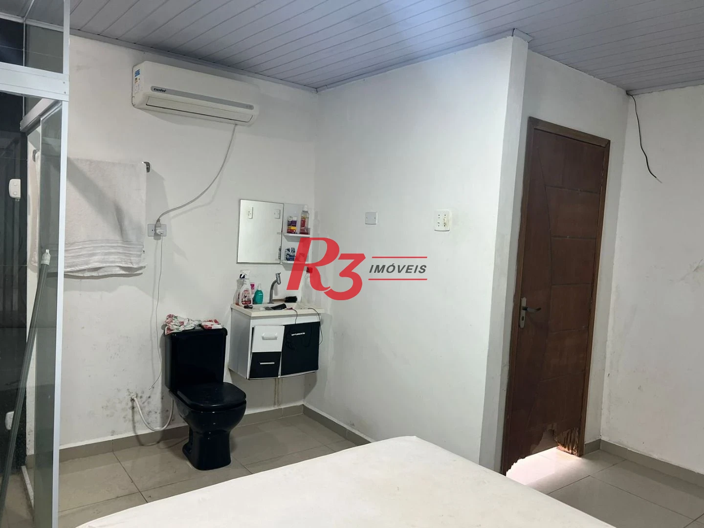 Casa à venda, 100 m² por R$ 320.000,00 - Vila Mateo Bei - São Vicente/SP