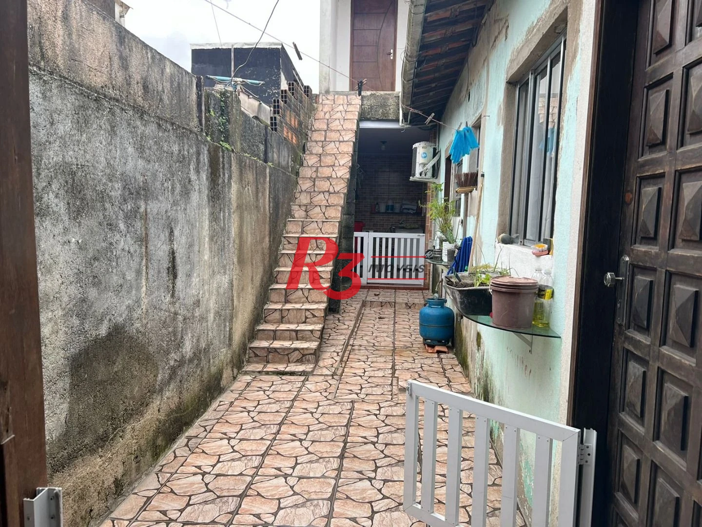 Casa à venda, 100 m² por R$ 320.000,00 - Vila Mateo Bei - São Vicente/SP