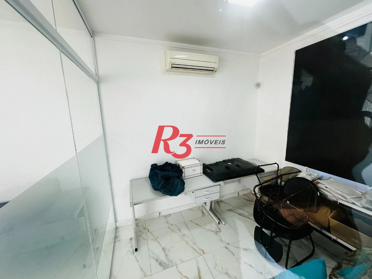 Sobrado com 4 dormitórios à venda, 245 m² por R$ 1.350.000,00 - Ponta da Praia - Santos/SP