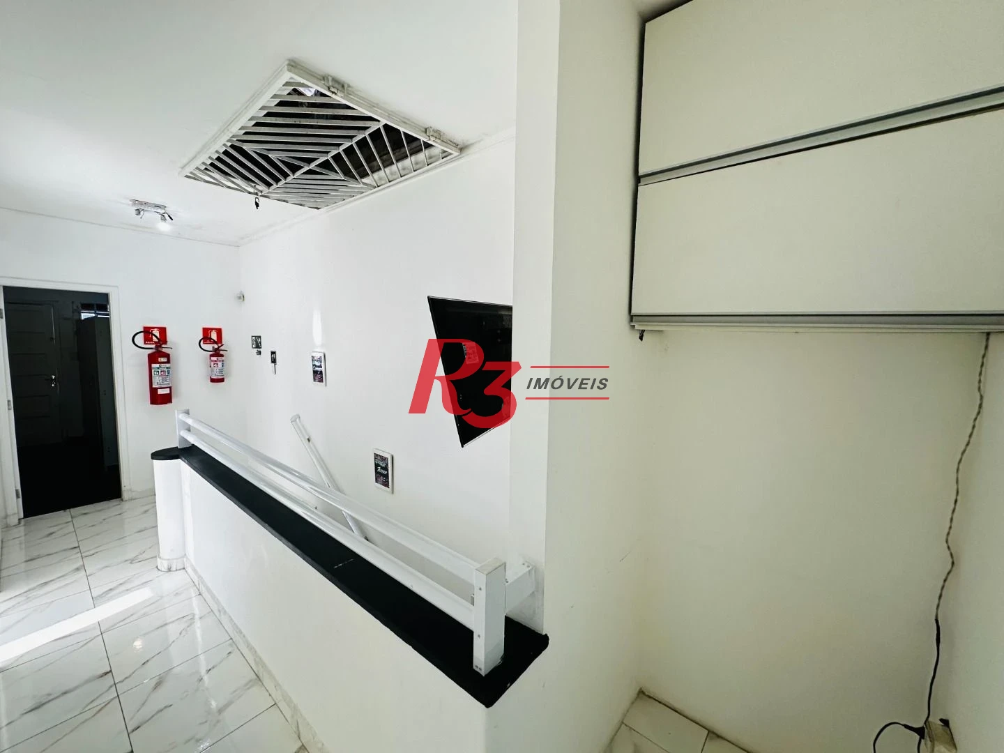 Sobrado com 4 dormitórios à venda, 245 m² por R$ 1.350.000,00 - Ponta da Praia - Santos/SP