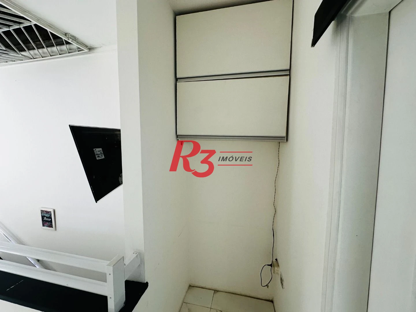 Sobrado com 4 dormitórios à venda, 245 m² por R$ 1.350.000,00 - Ponta da Praia - Santos/SP