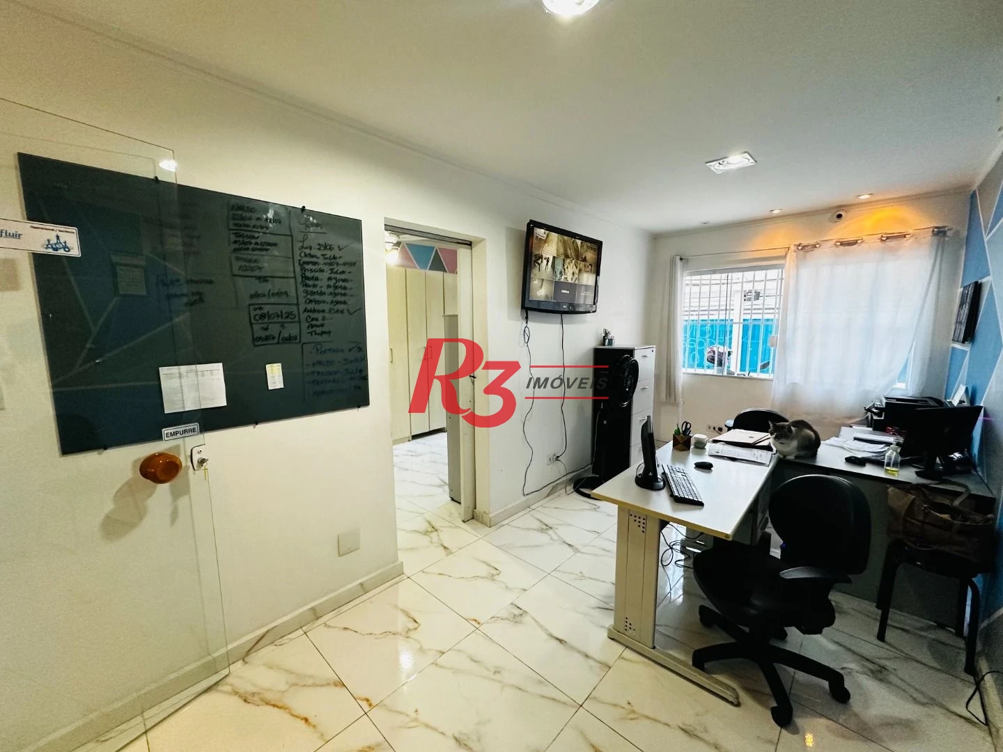 Sobrado com 4 dormitórios à venda, 245 m² por R$ 1.350.000,00 - Ponta da Praia - Santos/SP