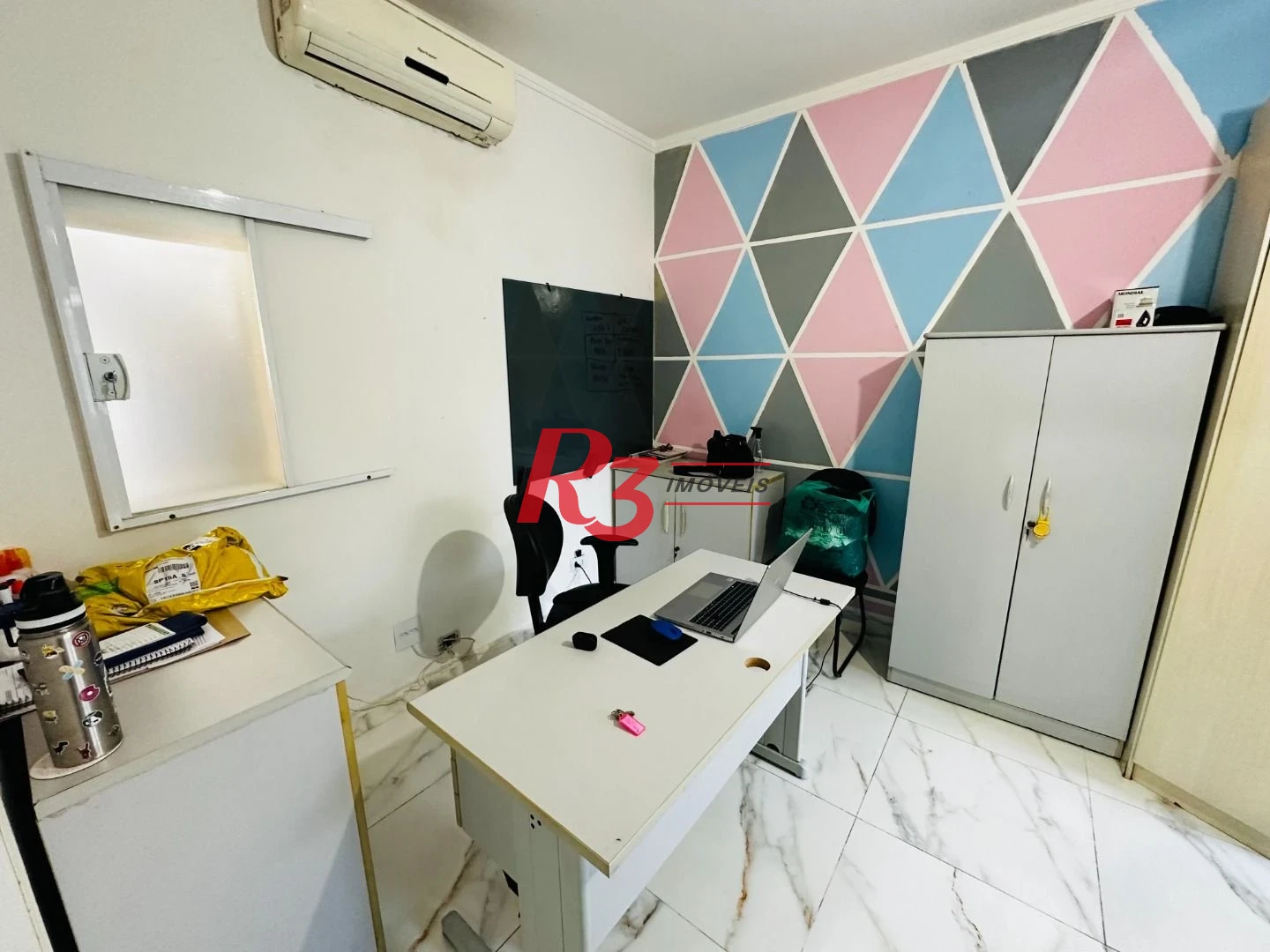Sobrado com 4 dormitórios à venda, 245 m² por R$ 1.350.000,00 - Ponta da Praia - Santos/SP