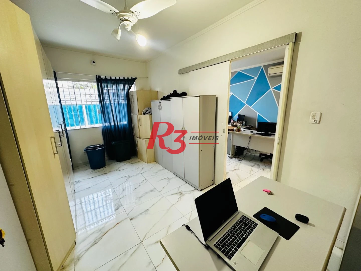 Sobrado com 4 dormitórios à venda, 245 m² por R$ 1.350.000,00 - Ponta da Praia - Santos/SP