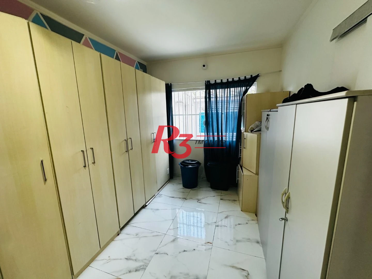 Sobrado com 4 dormitórios à venda, 245 m² por R$ 1.350.000,00 - Ponta da Praia - Santos/SP