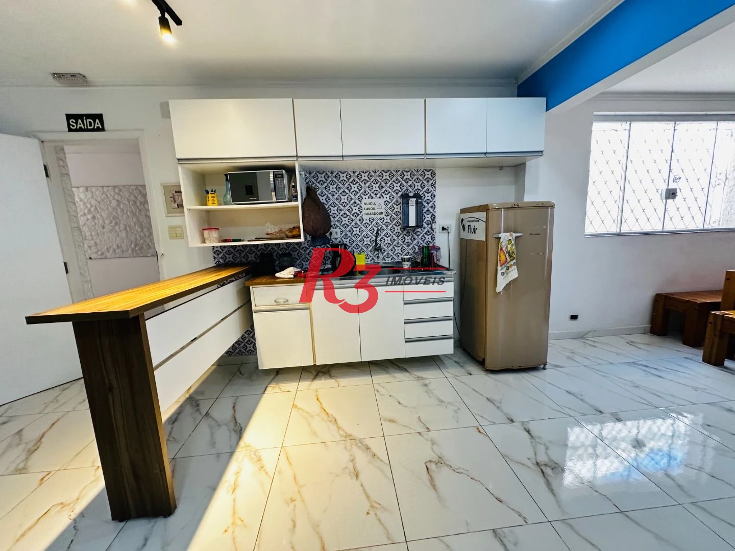 Sobrado com 4 dormitórios à venda, 245 m² por R$ 1.350.000,00 - Ponta da Praia - Santos/SP