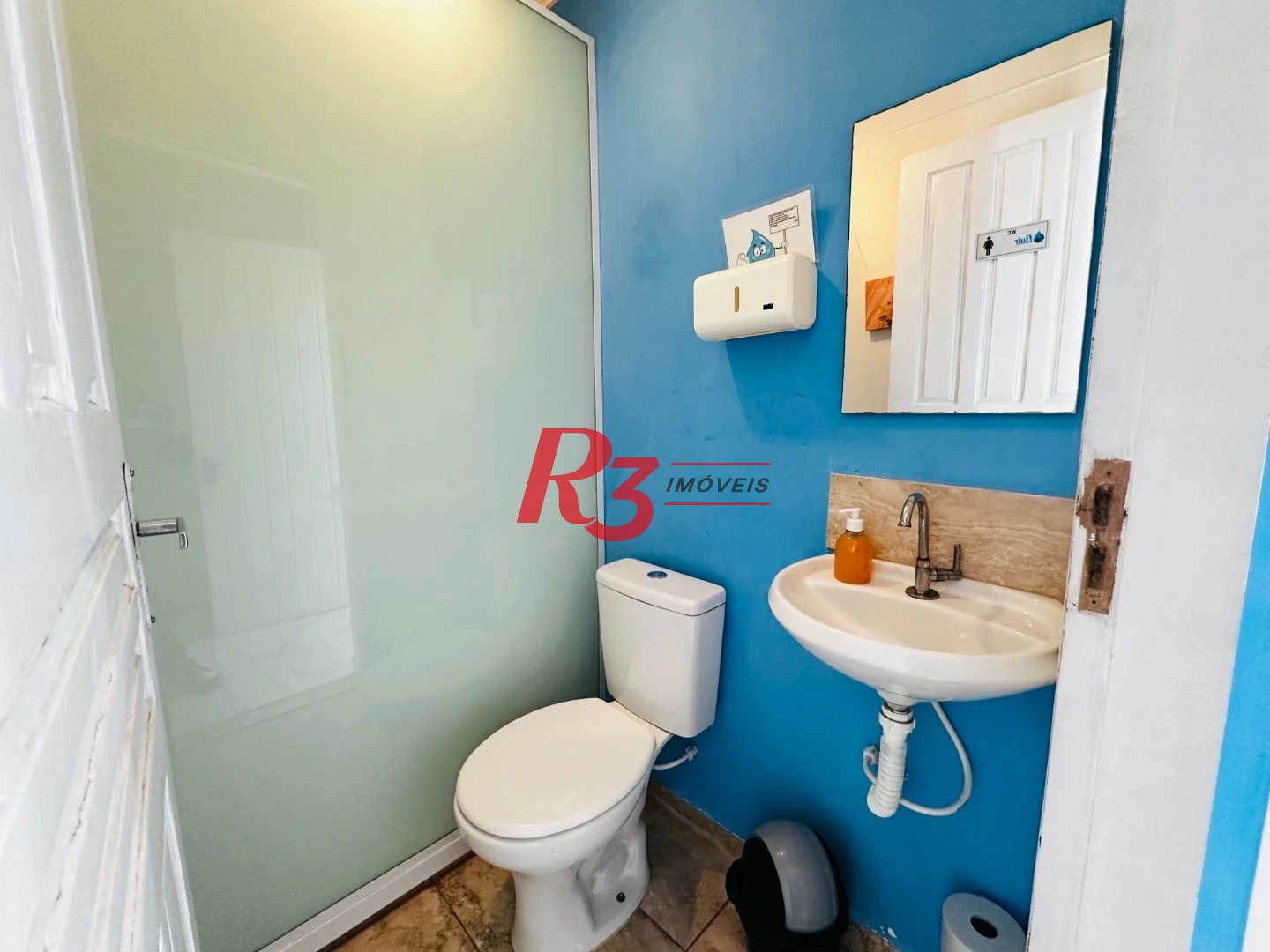 Sobrado com 4 dormitórios à venda, 245 m² por R$ 1.350.000,00 - Ponta da Praia - Santos/SP
