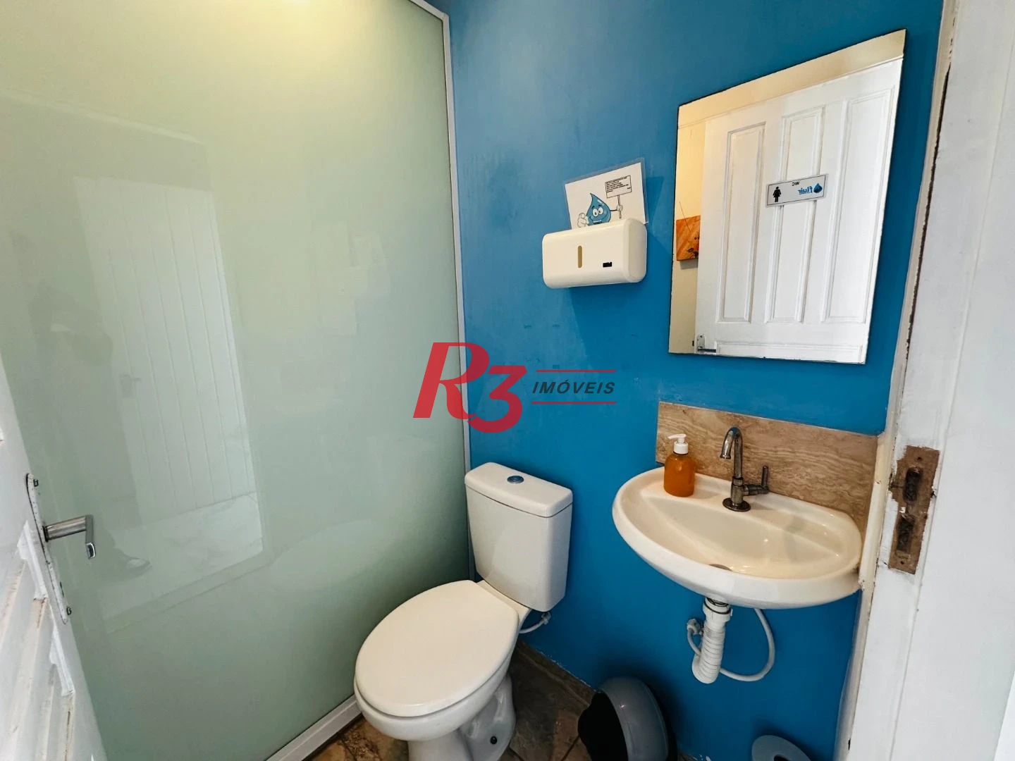 Sobrado com 4 dormitórios à venda, 245 m² por R$ 1.350.000,00 - Ponta da Praia - Santos/SP