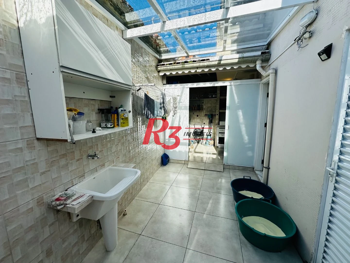 Sobrado com 4 dormitórios à venda, 245 m² por R$ 1.350.000,00 - Ponta da Praia - Santos/SP