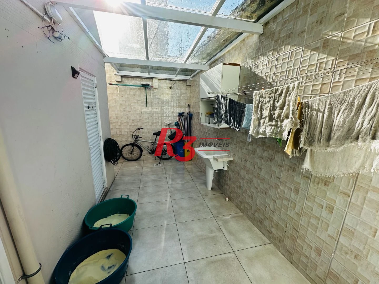 Sobrado com 4 dormitórios à venda, 245 m² por R$ 1.350.000,00 - Ponta da Praia - Santos/SP