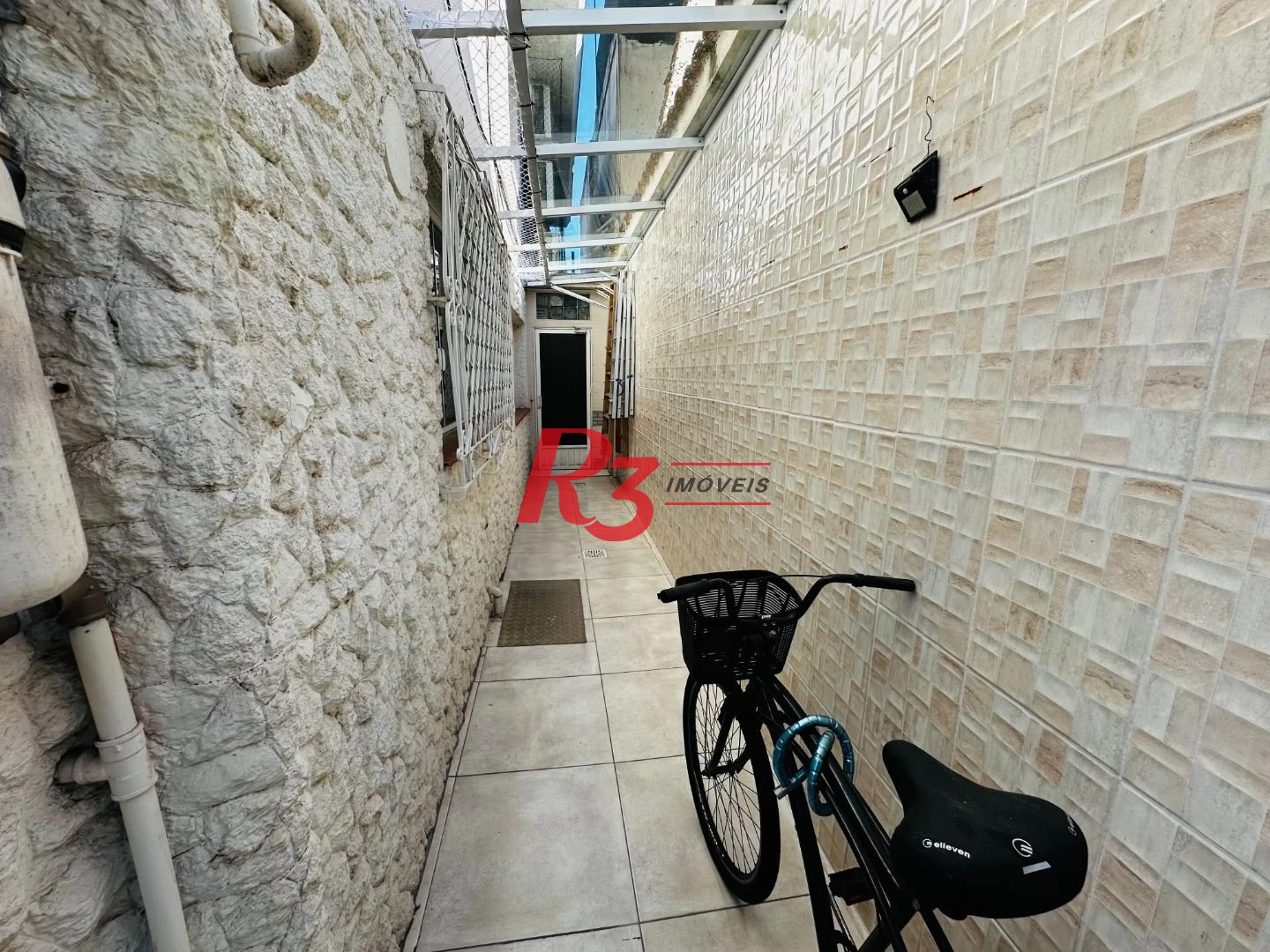 Sobrado com 4 dormitórios à venda, 245 m² por R$ 1.350.000,00 - Ponta da Praia - Santos/SP