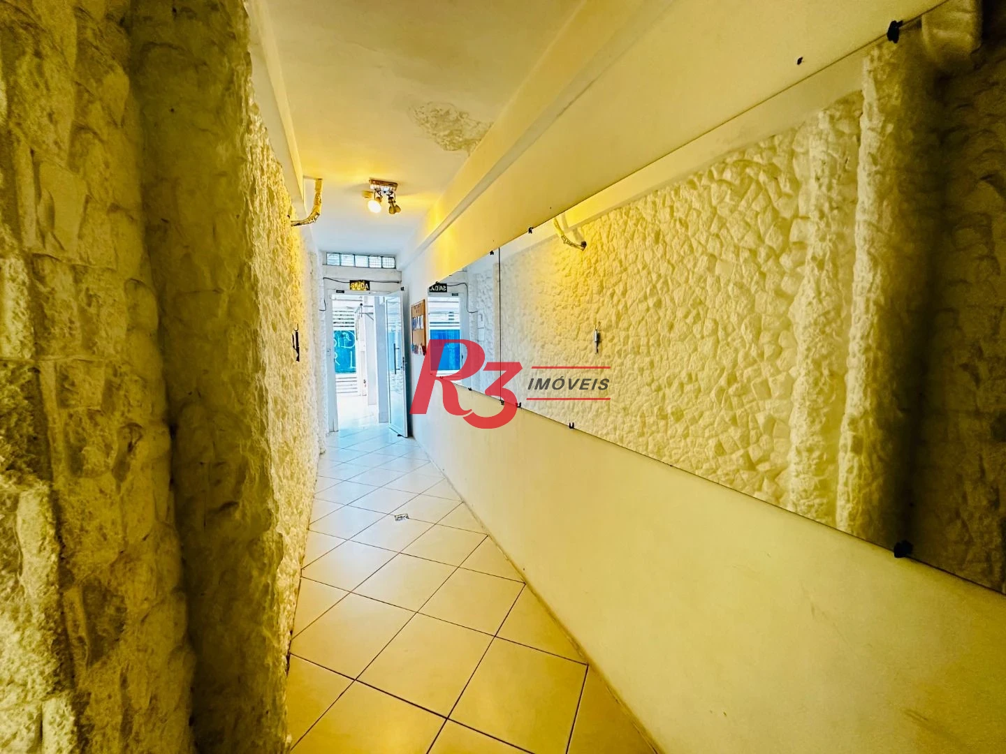 Sobrado com 4 dormitórios à venda, 245 m² por R$ 1.350.000,00 - Ponta da Praia - Santos/SP