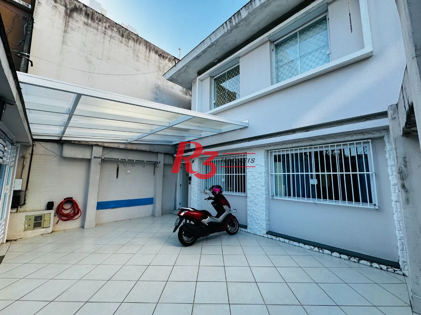 Sobrado com 4 dormitórios à venda, 245 m² por R$ 1.350.000,00 - Ponta da Praia - Santos/SP
