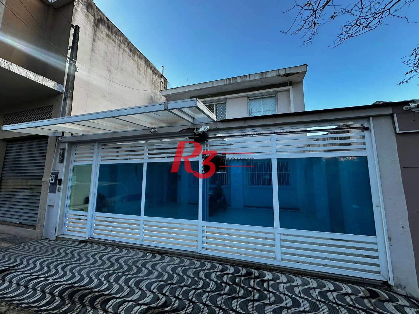 Sobrado com 4 dormitórios à venda, 245 m² por R$ 1.350.000,00 - Ponta da Praia - Santos/SP