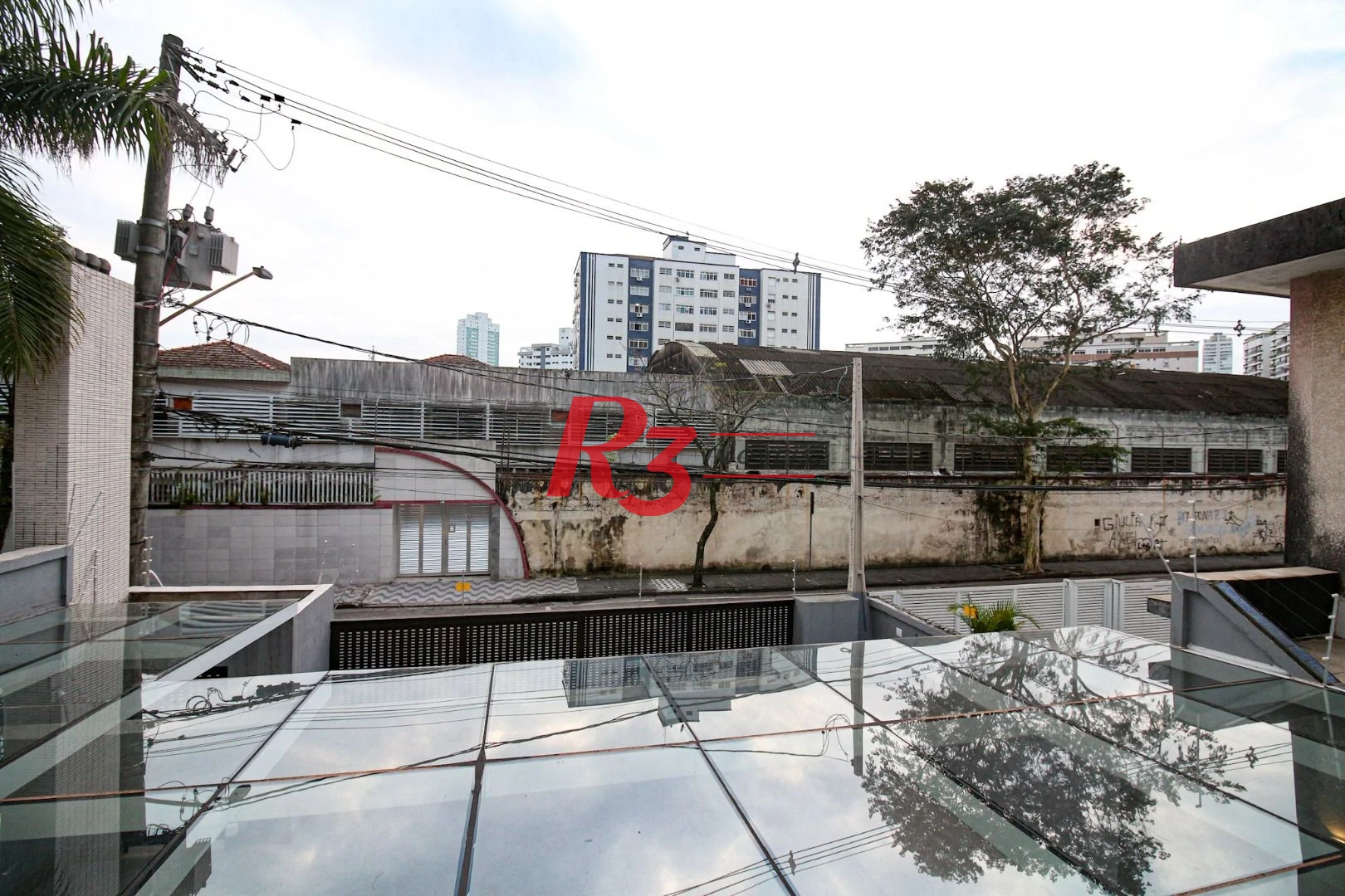 Casa com 3 suítes à venda, 300 m² por R$ 4.500.000 - Ponta da Praia - Santos/SP