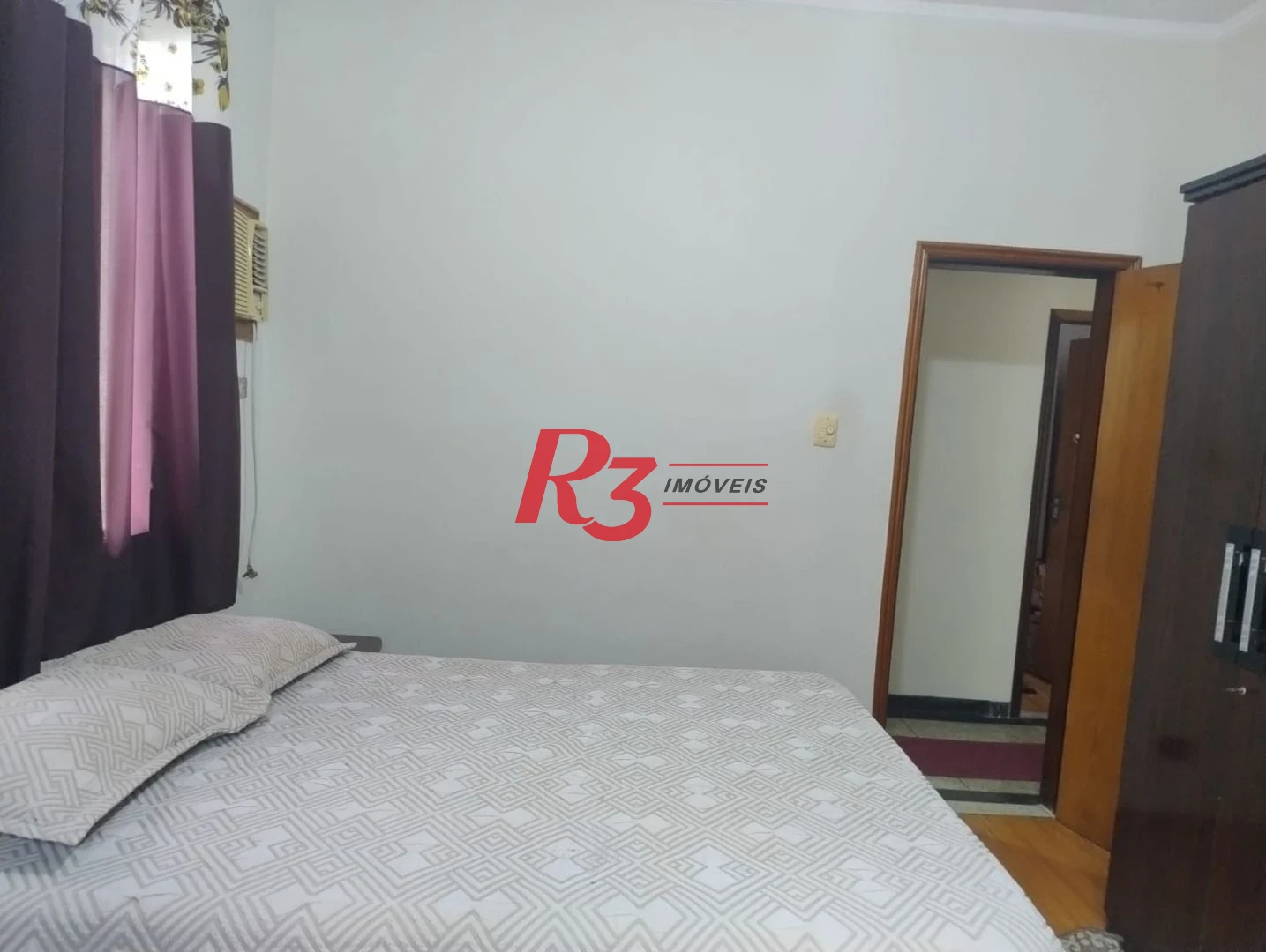 Sobrado com 3 dormitórios à venda, 226 m² por R$ 700.000,00 - Centro - São Vicente/SP