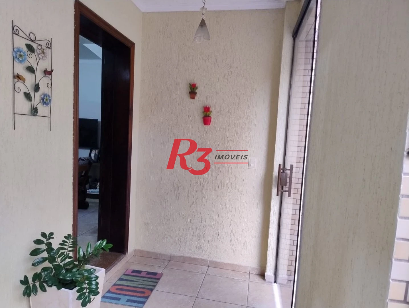 Sobrado com 3 dormitórios à venda, 226 m² por R$ 700.000,00 - Centro - São Vicente/SP