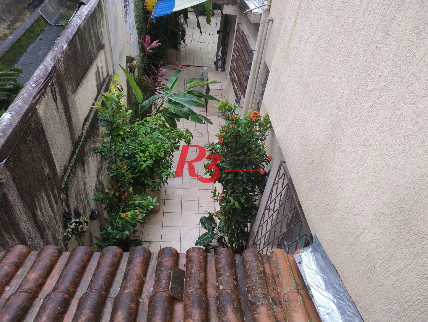 Sobrado com 3 dormitórios à venda, 226 m² por R$ 700.000,00 - Centro - São Vicente/SP