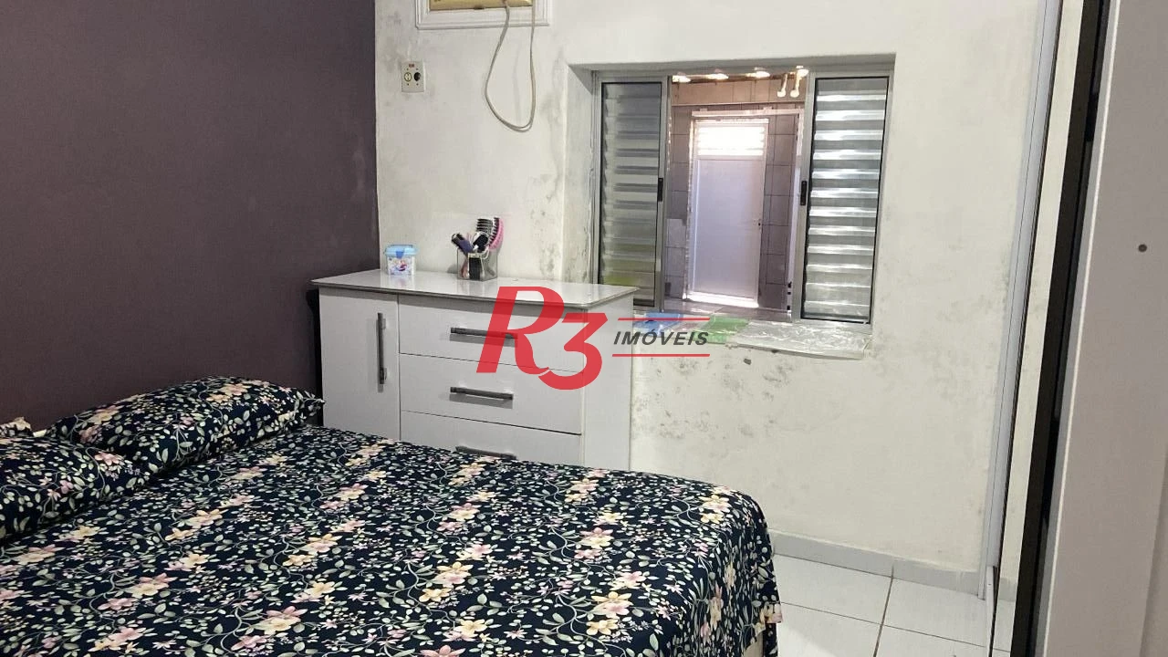 Casa com 3 dormitórios à venda por R$ 426.000 - Parque Bitaru - São Vicente/SP
