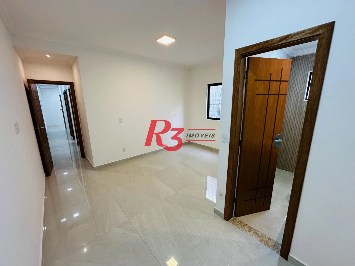 Sobrado com 3 dormitórios à venda, 220 m² por R$ 1.600.000,00 - Embaré - Santos/SP