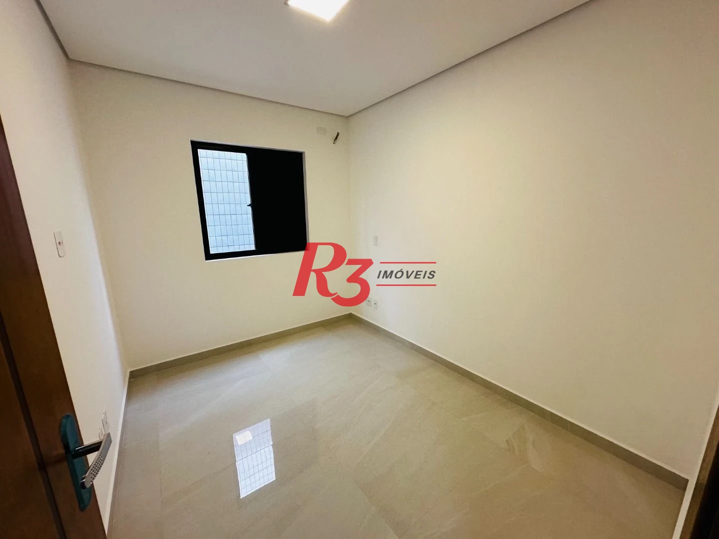 Sobrado com 3 dormitórios à venda, 220 m² por R$ 1.600.000,00 - Embaré - Santos/SP