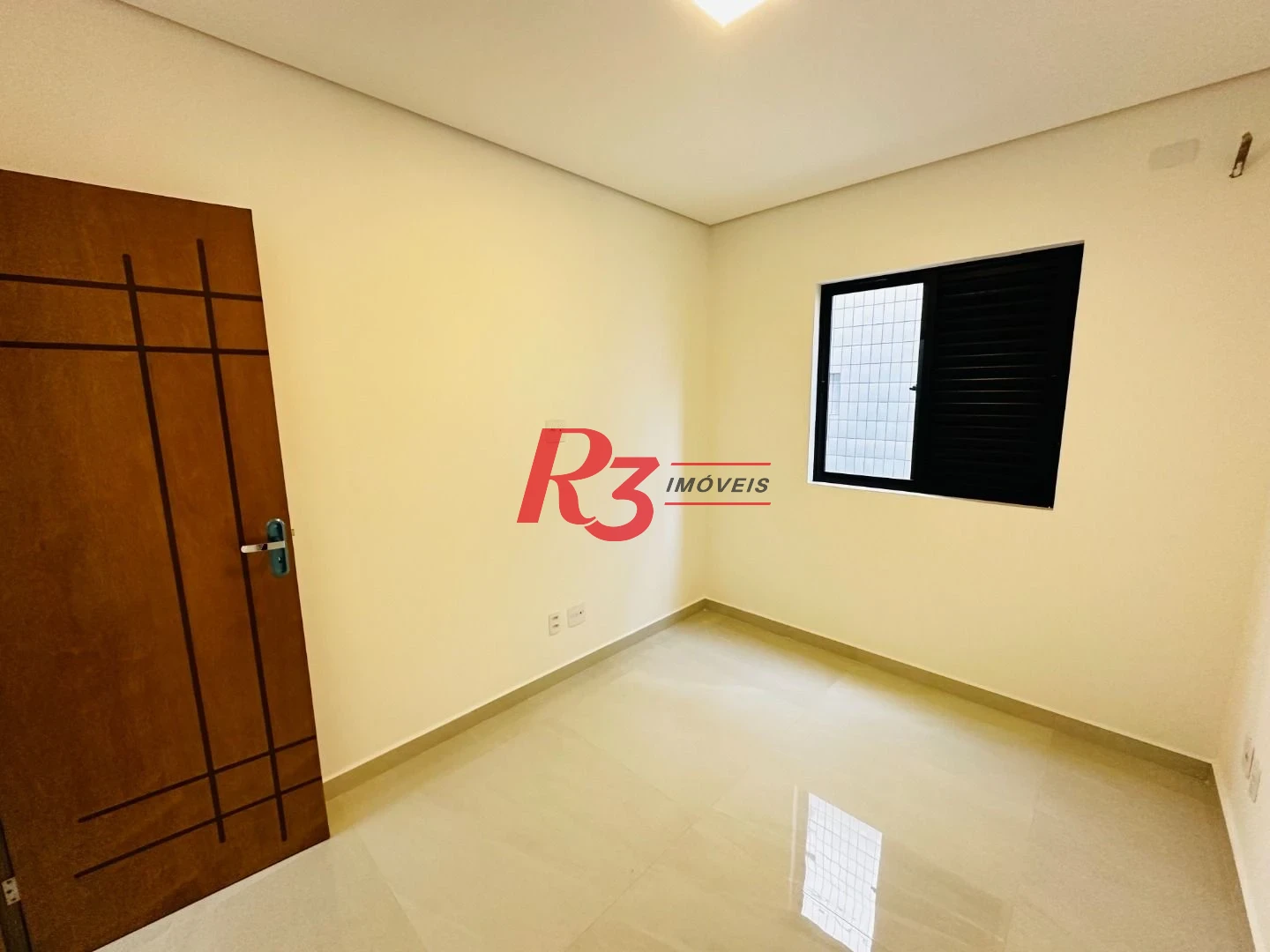 Sobrado com 3 dormitórios à venda, 220 m² por R$ 1.600.000,00 - Embaré - Santos/SP