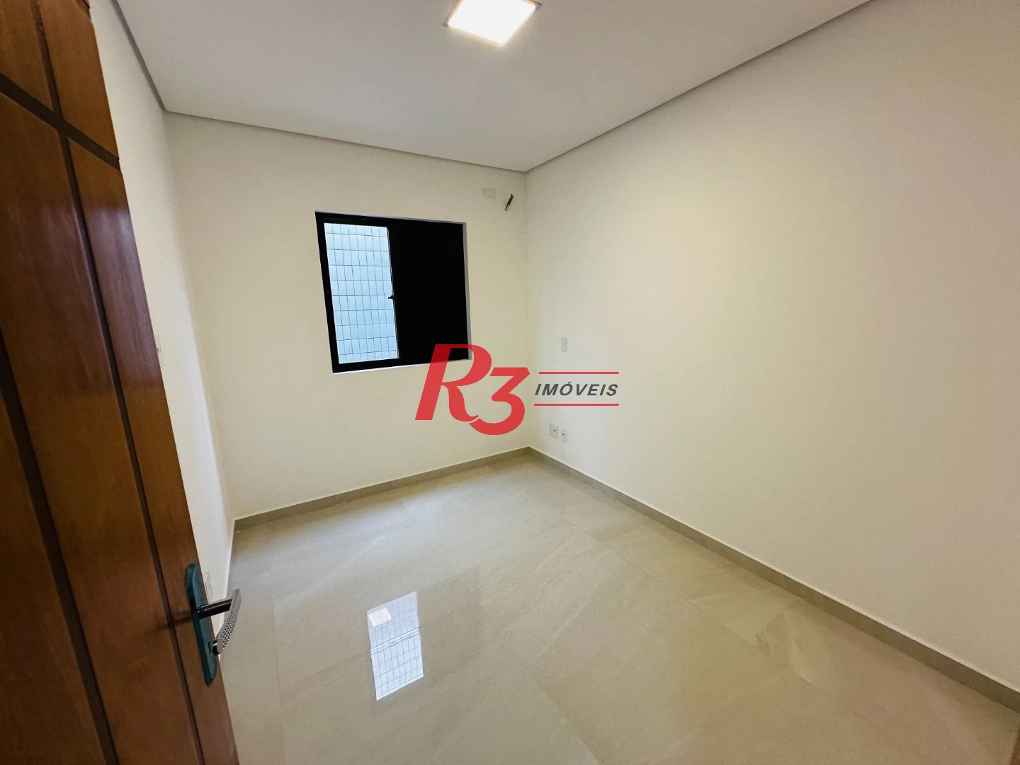 Sobrado com 3 dormitórios à venda, 220 m² por R$ 1.600.000,00 - Embaré - Santos/SP