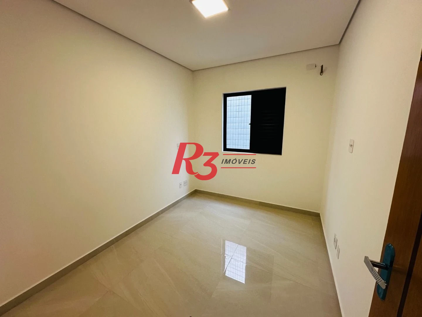 Sobrado com 3 dormitórios à venda, 220 m² por R$ 1.600.000,00 - Embaré - Santos/SP
