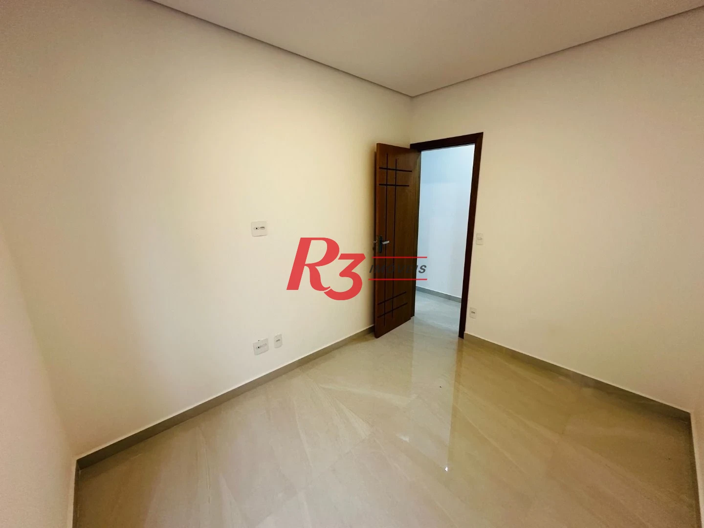 Sobrado com 3 dormitórios à venda, 220 m² por R$ 1.600.000,00 - Embaré - Santos/SP
