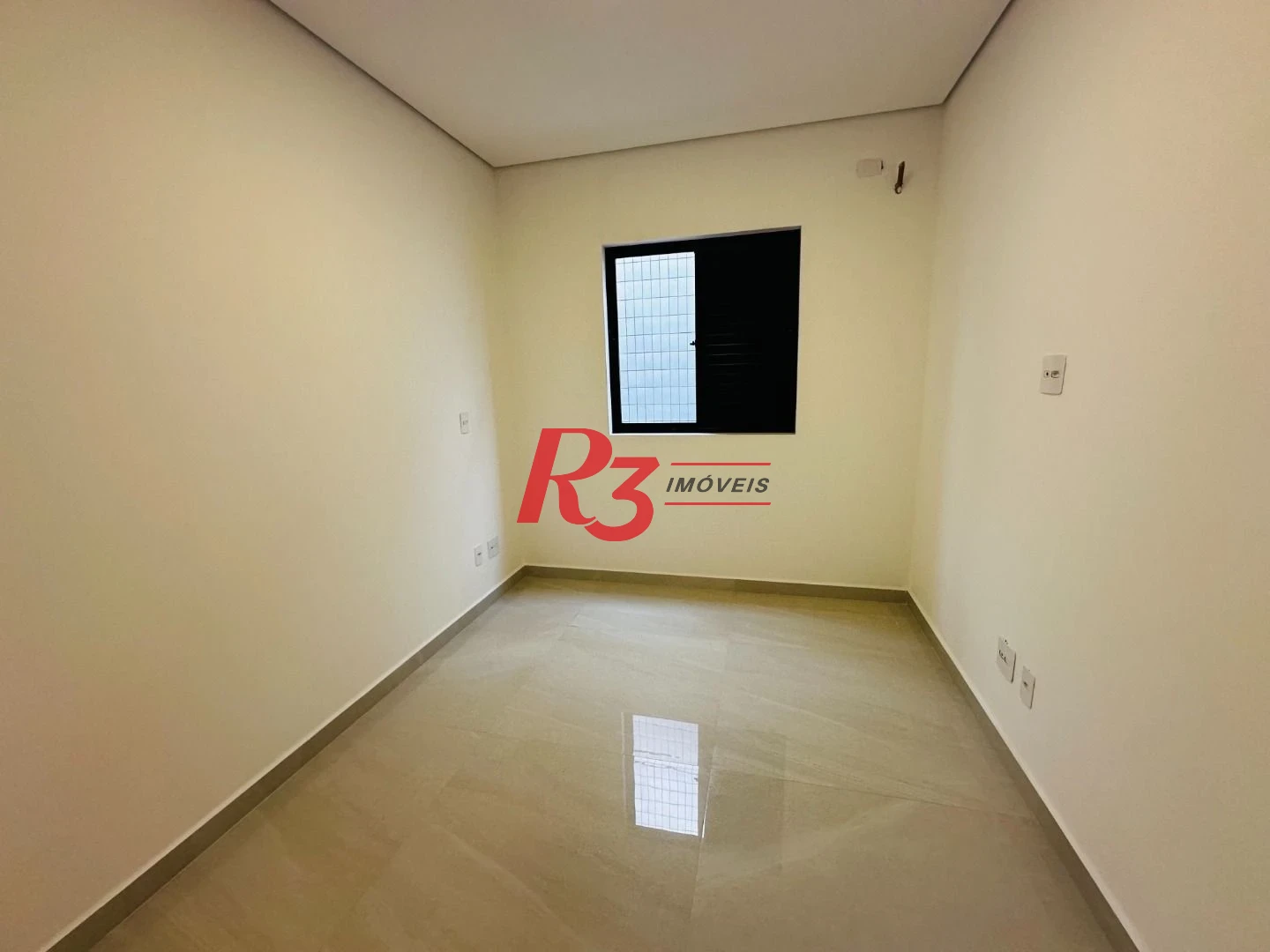 Sobrado com 3 dormitórios à venda, 220 m² por R$ 1.600.000,00 - Embaré - Santos/SP
