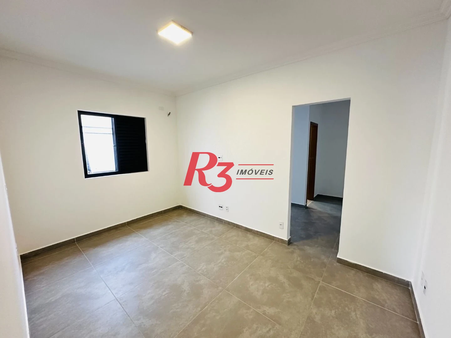 Sobrado com 3 dormitórios à venda, 220 m² por R$ 1.600.000,00 - Embaré - Santos/SP