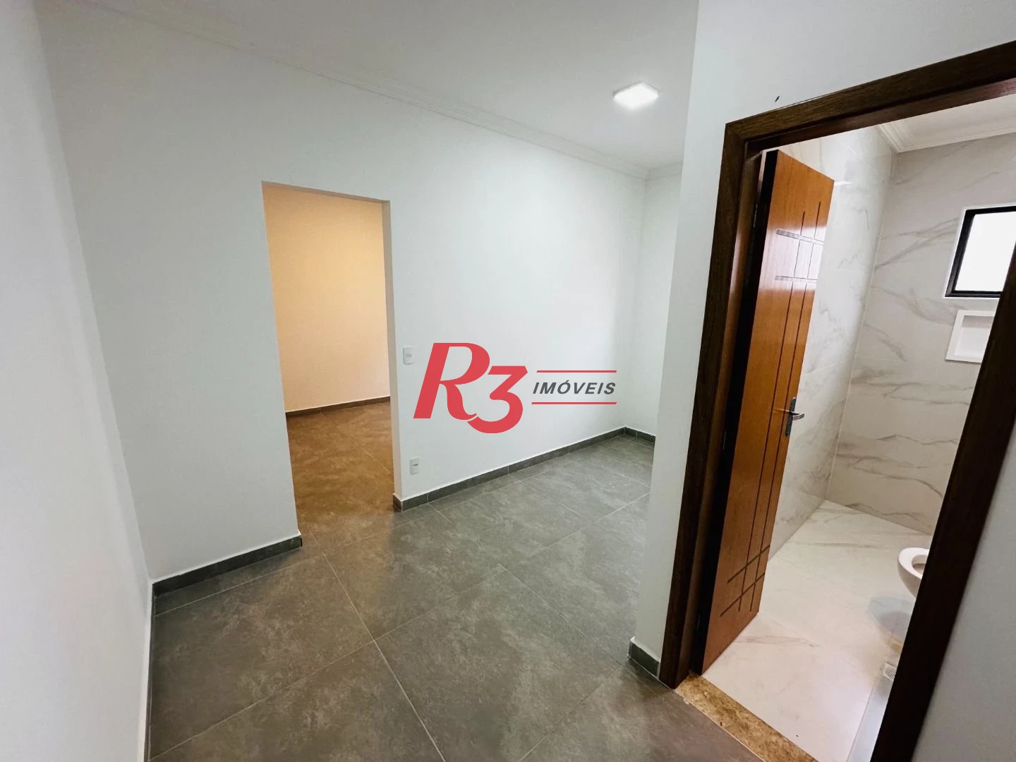 Sobrado com 3 dormitórios à venda, 220 m² por R$ 1.600.000,00 - Embaré - Santos/SP
