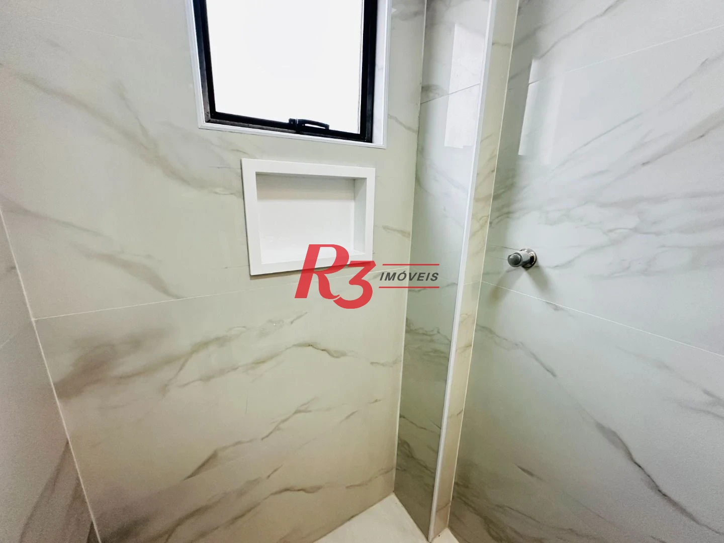 Sobrado com 3 dormitórios à venda, 220 m² por R$ 1.600.000,00 - Embaré - Santos/SP