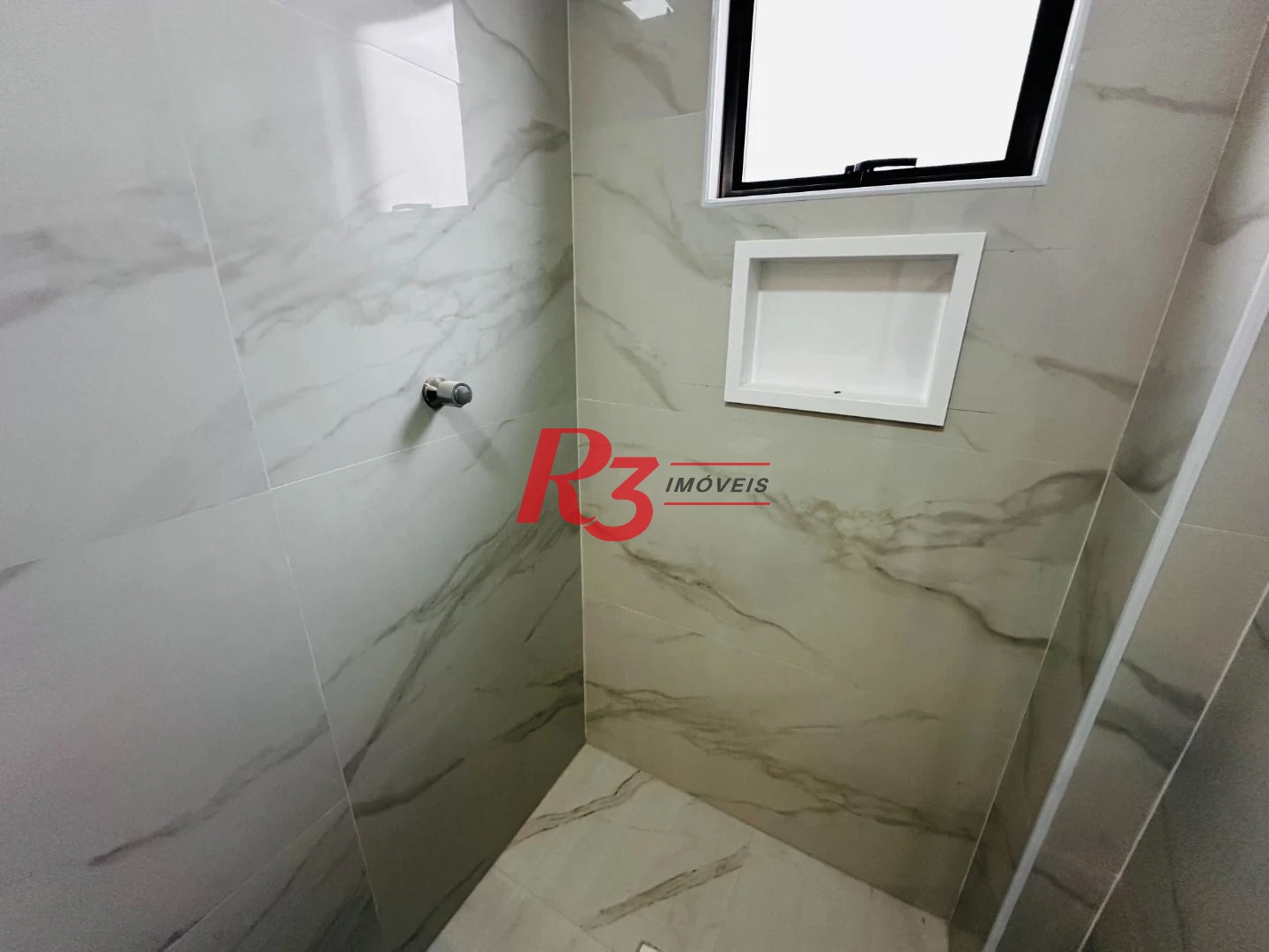 Sobrado com 3 dormitórios à venda, 220 m² por R$ 1.600.000,00 - Embaré - Santos/SP