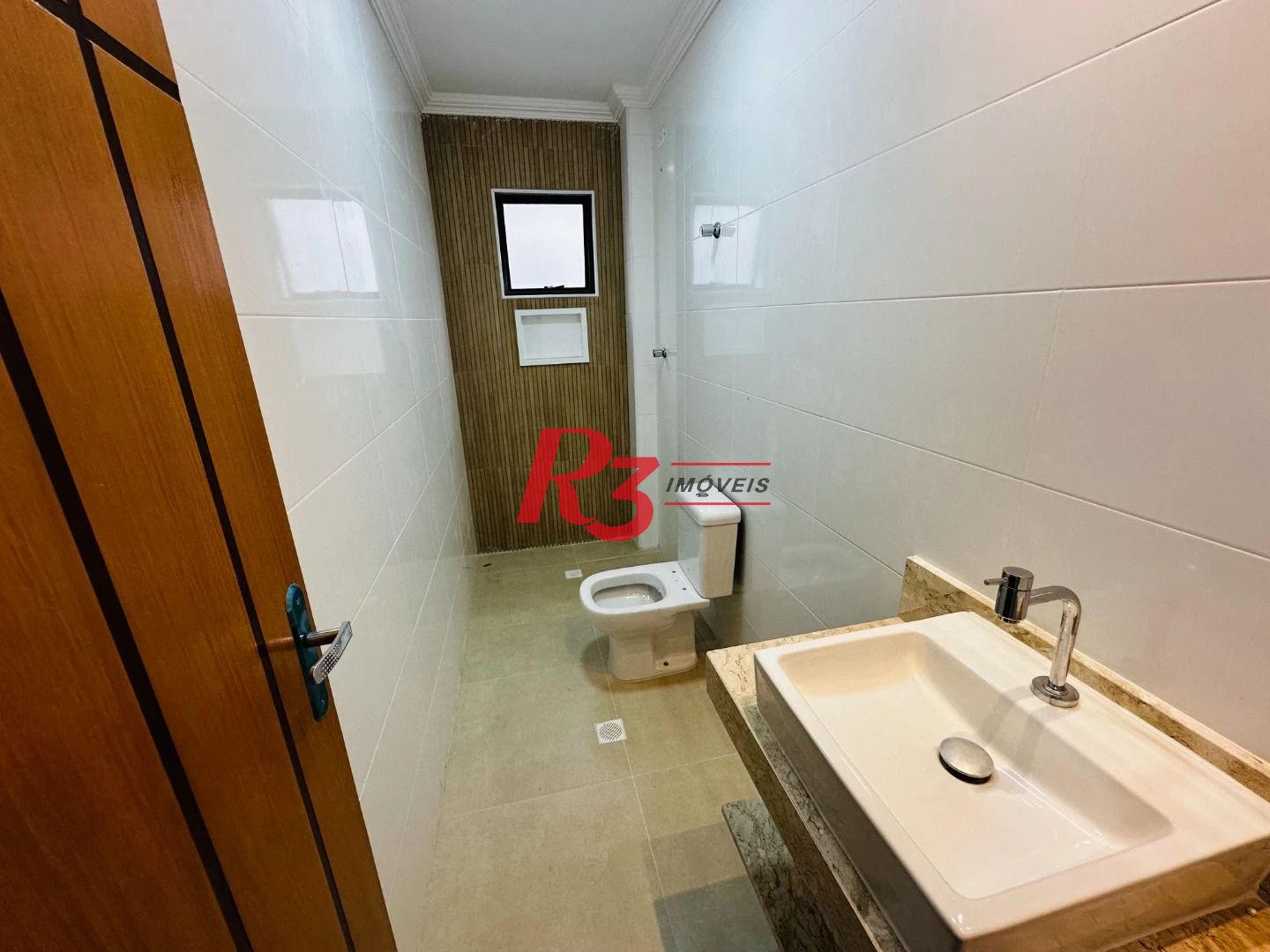 Sobrado com 3 dormitórios à venda, 220 m² por R$ 1.600.000,00 - Embaré - Santos/SP
