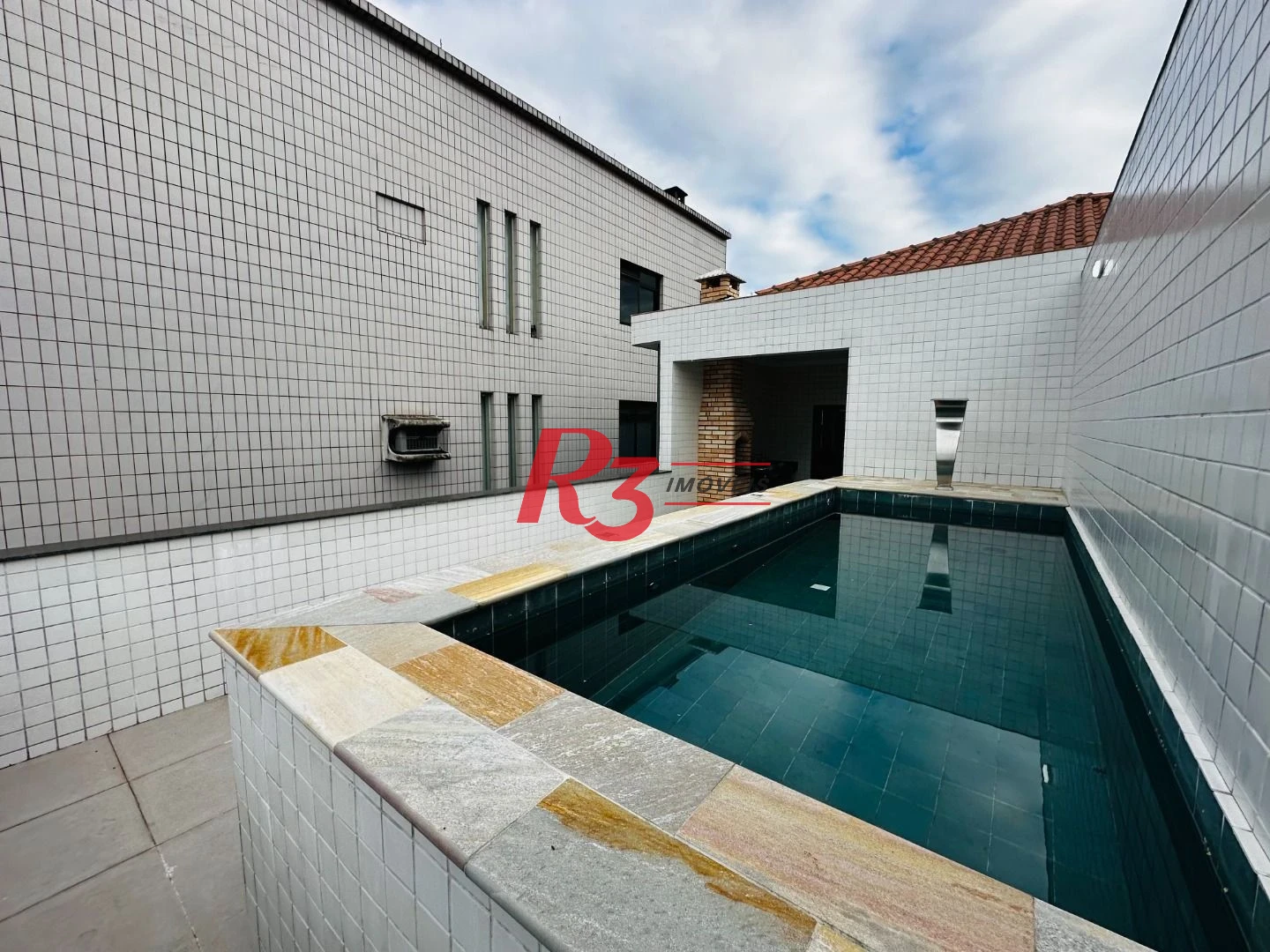 Sobrado com 3 dormitórios à venda, 220 m² por R$ 1.600.000,00 - Embaré - Santos/SP
