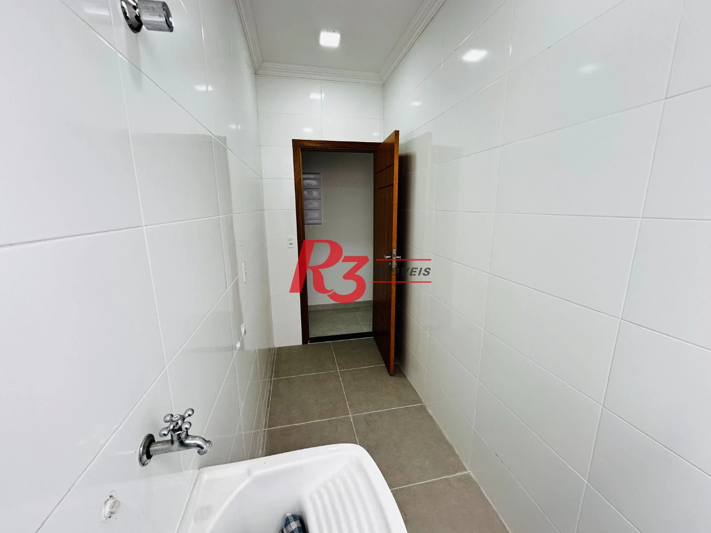 Sobrado com 3 dormitórios à venda, 220 m² por R$ 1.600.000,00 - Embaré - Santos/SP
