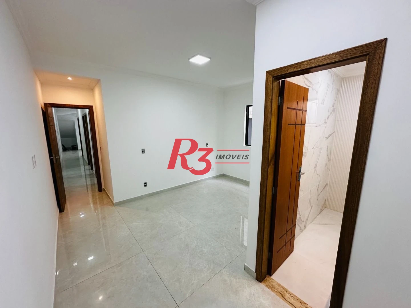 Sobrado com 3 dormitórios à venda, 160 m² por R$ 950.000,00 - Embaré - Santos/SP