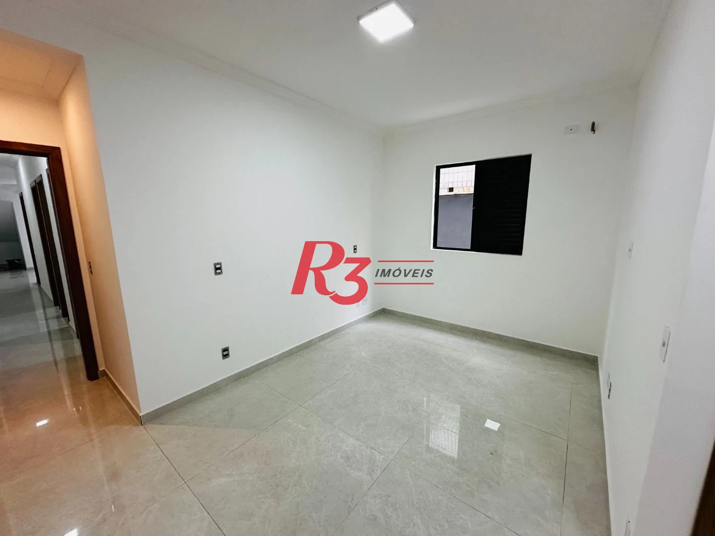 Sobrado com 3 dormitórios à venda, 160 m² por R$ 950.000,00 - Embaré - Santos/SP
