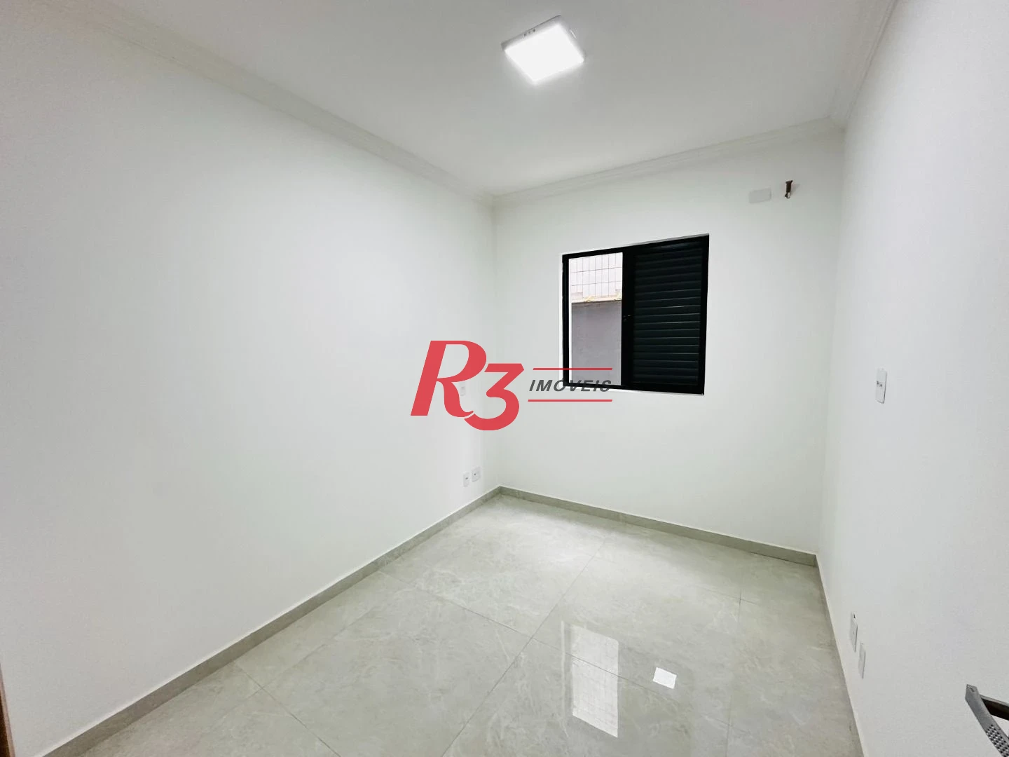 Sobrado com 3 dormitórios à venda, 160 m² por R$ 950.000,00 - Embaré - Santos/SP