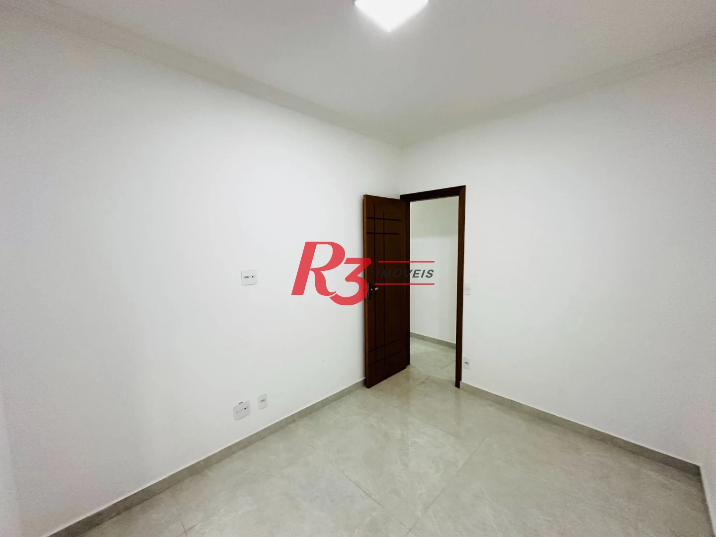 Sobrado com 3 dormitórios à venda, 160 m² por R$ 950.000,00 - Embaré - Santos/SP