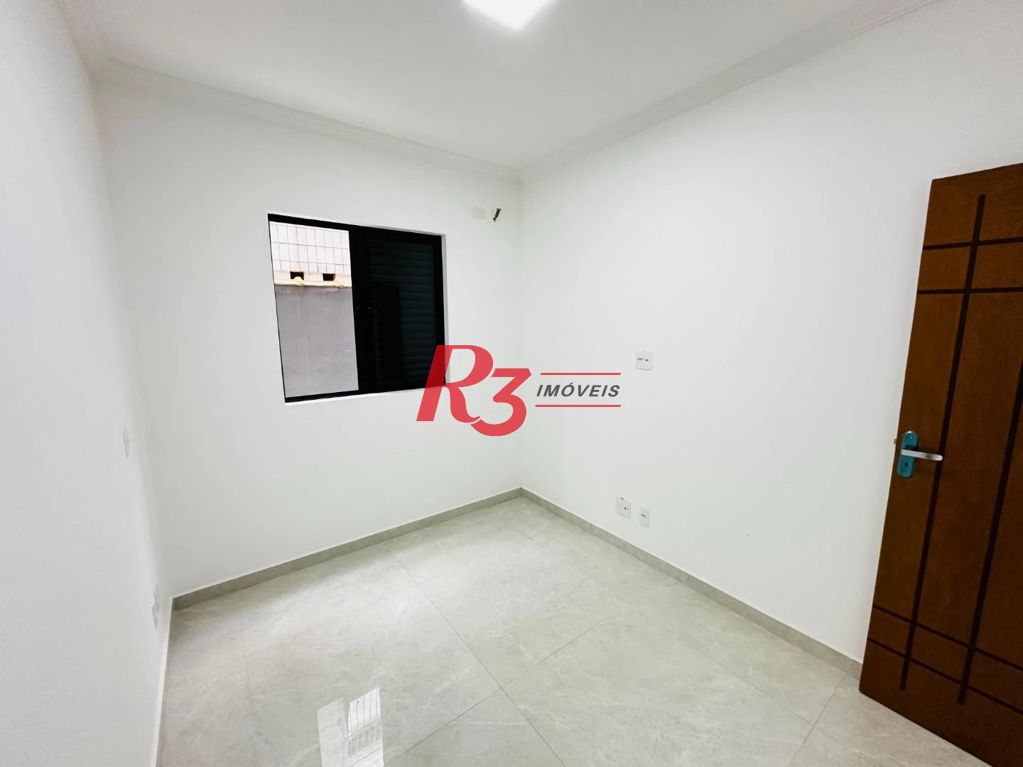 Sobrado com 3 dormitórios à venda, 160 m² por R$ 950.000,00 - Embaré - Santos/SP