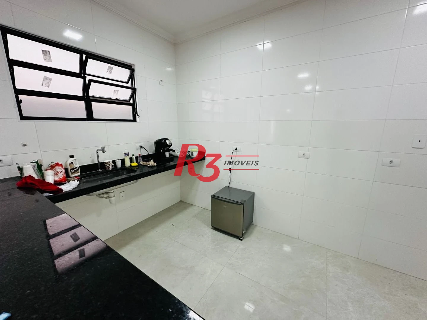 Sobrado com 3 dormitórios à venda, 160 m² por R$ 950.000,00 - Embaré - Santos/SP