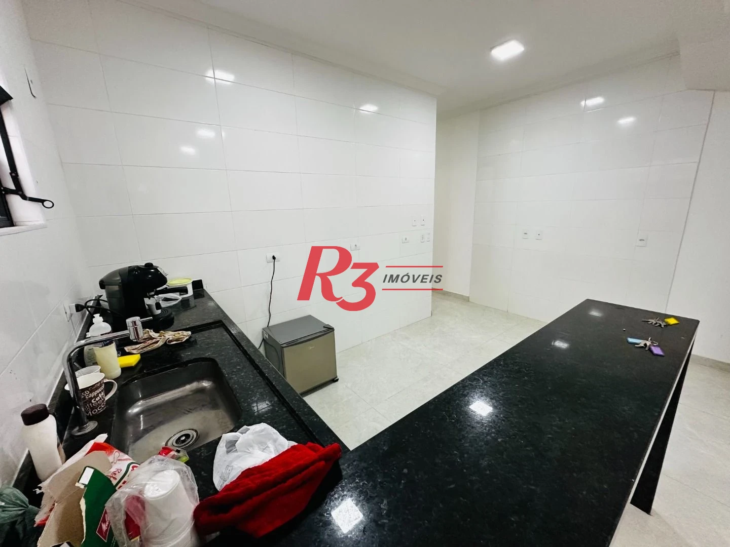 Sobrado com 3 dormitórios à venda, 160 m² por R$ 950.000,00 - Embaré - Santos/SP