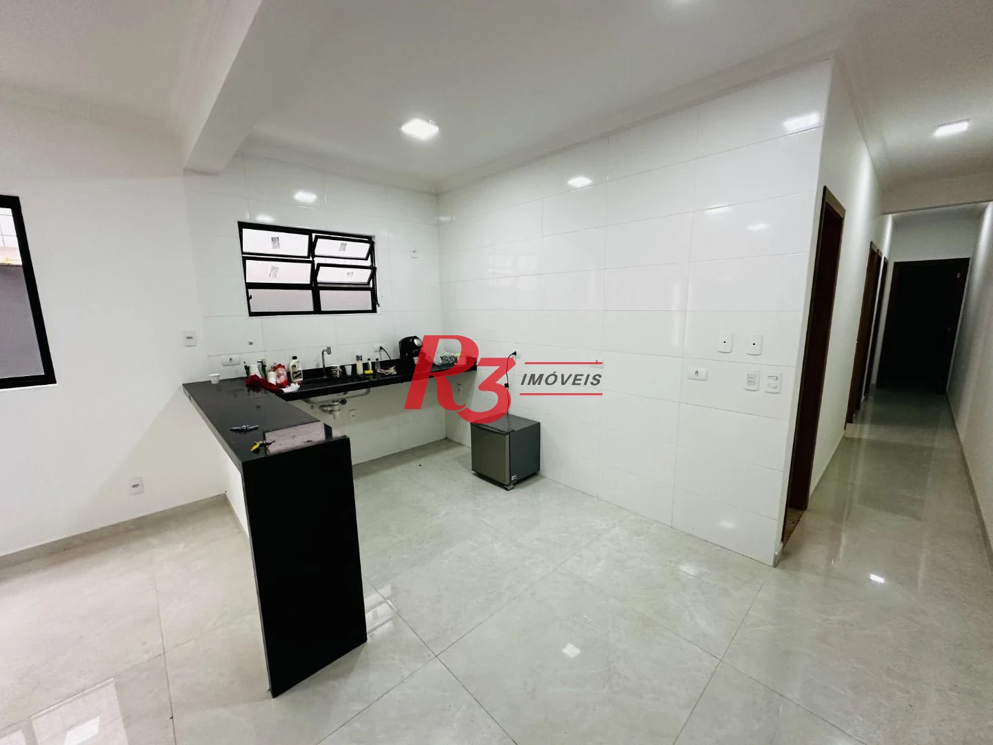 Sobrado com 3 dormitórios à venda, 160 m² por R$ 950.000,00 - Embaré - Santos/SP