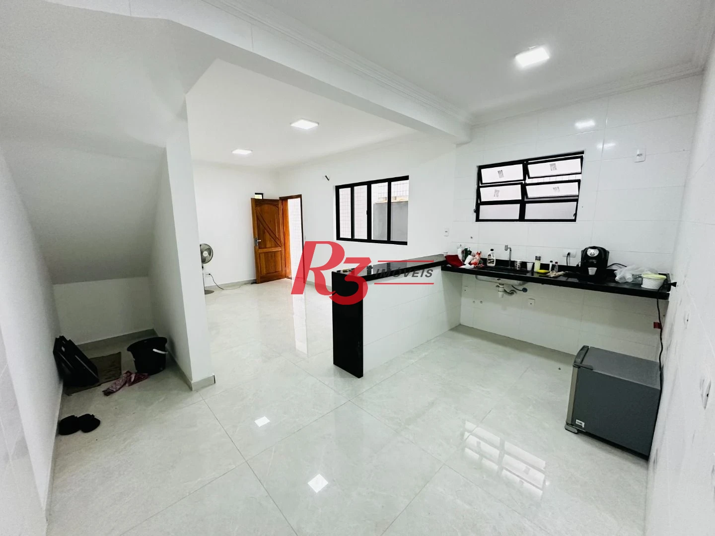 Sobrado com 3 dormitórios à venda, 160 m² por R$ 950.000,00 - Embaré - Santos/SP
