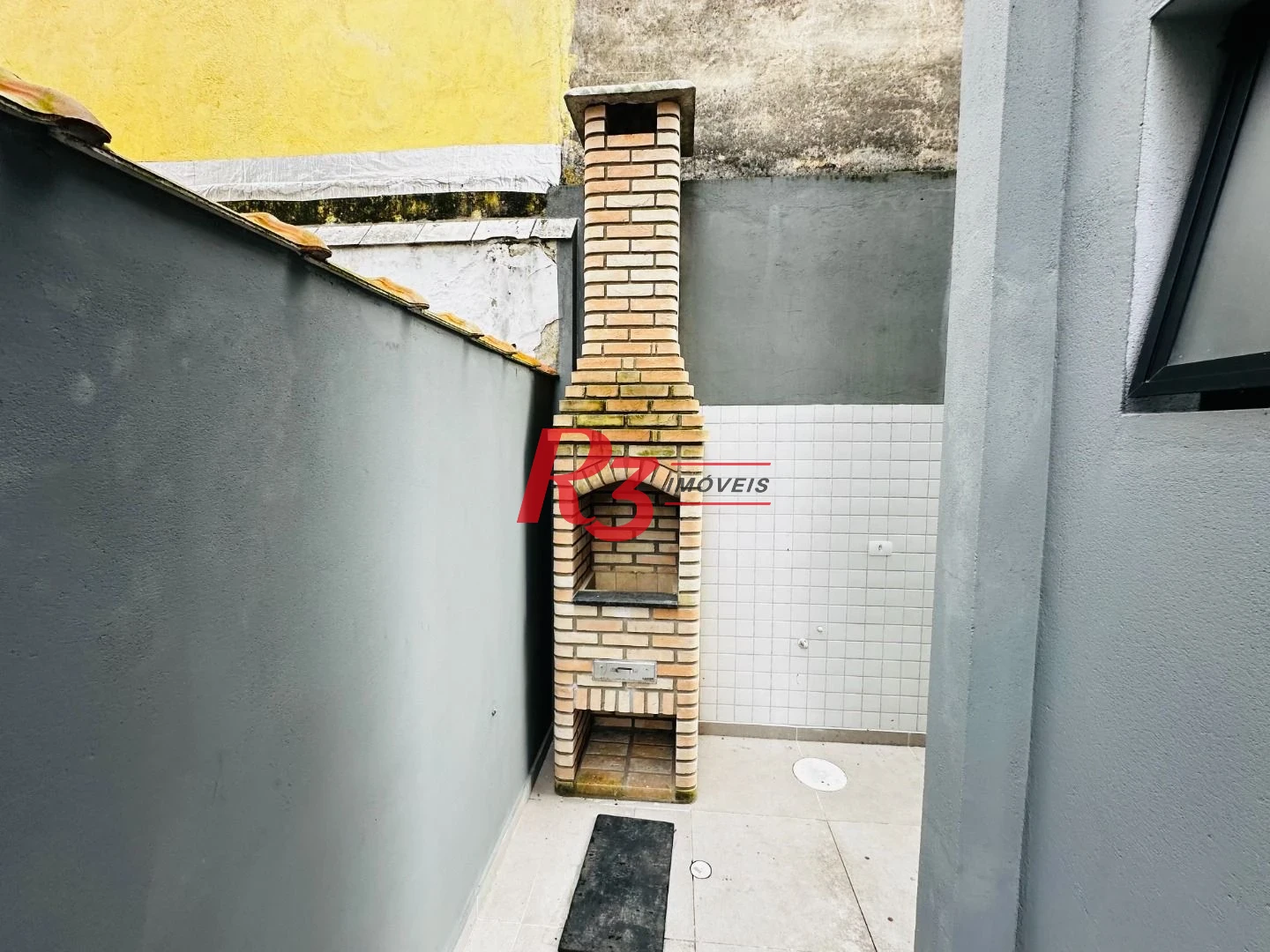 Sobrado com 3 dormitórios à venda, 160 m² por R$ 950.000,00 - Embaré - Santos/SP