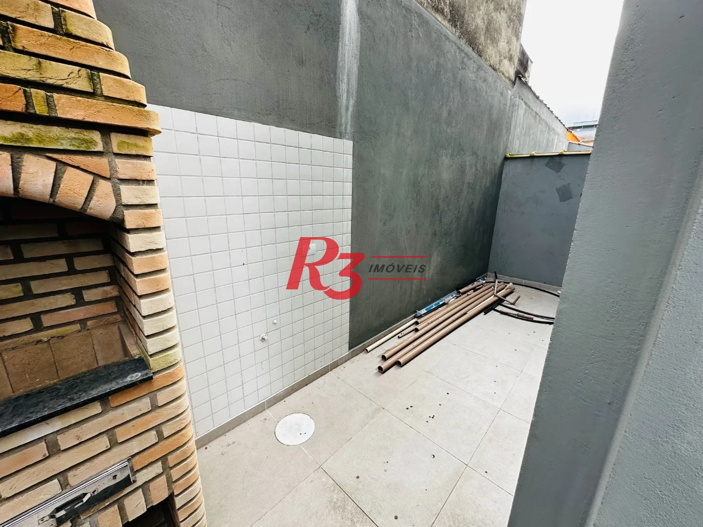 Sobrado com 3 dormitórios à venda, 160 m² por R$ 950.000,00 - Embaré - Santos/SP